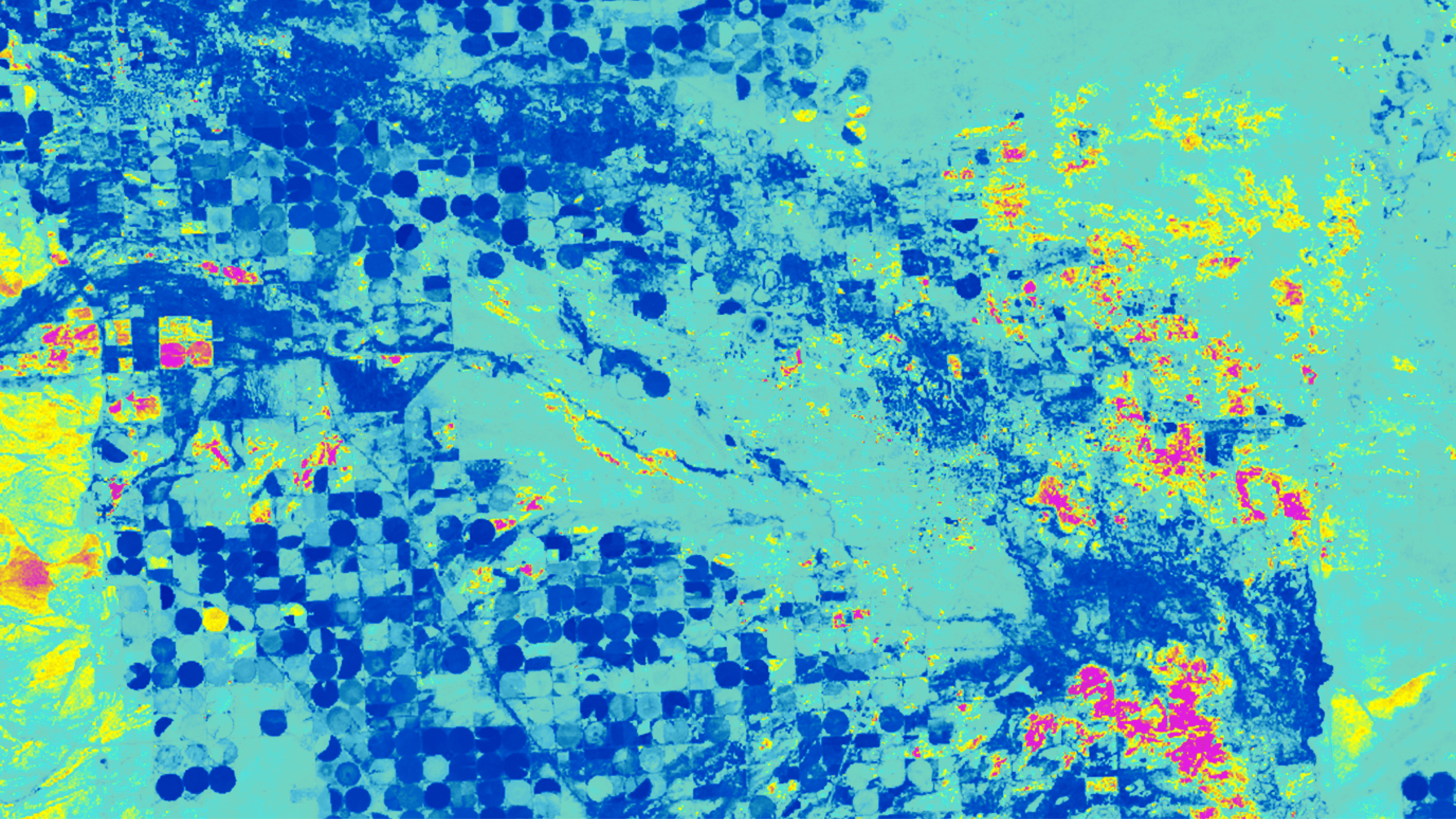 A multi-colored map showing weather conditions in yellow and red over blue-colored crop areas