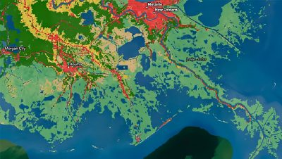 A map of southern Louisiana with colors ranging from green to red indicating areas of land-cover change detected by geospatial artificial intelligence
