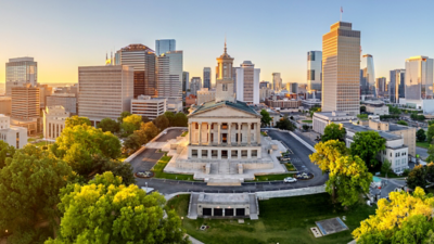 Aerial view of the Nashville, Tennessee skyline, with the Tennessee State Capitol building in the foreground.
